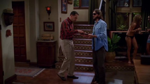 Two and a Half Men S09E05 A Giant Cat Holding a Churro